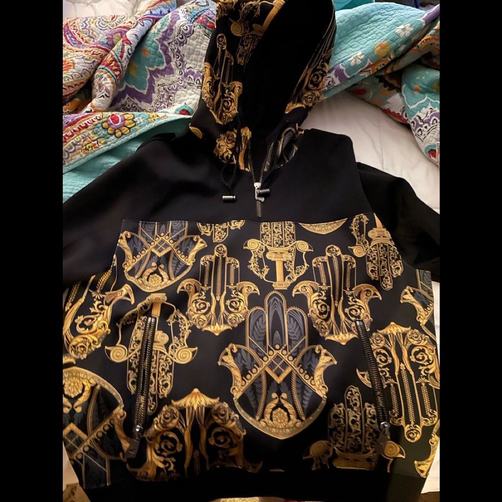 Authentic Versace Size L. Perfect condition, no rips etc